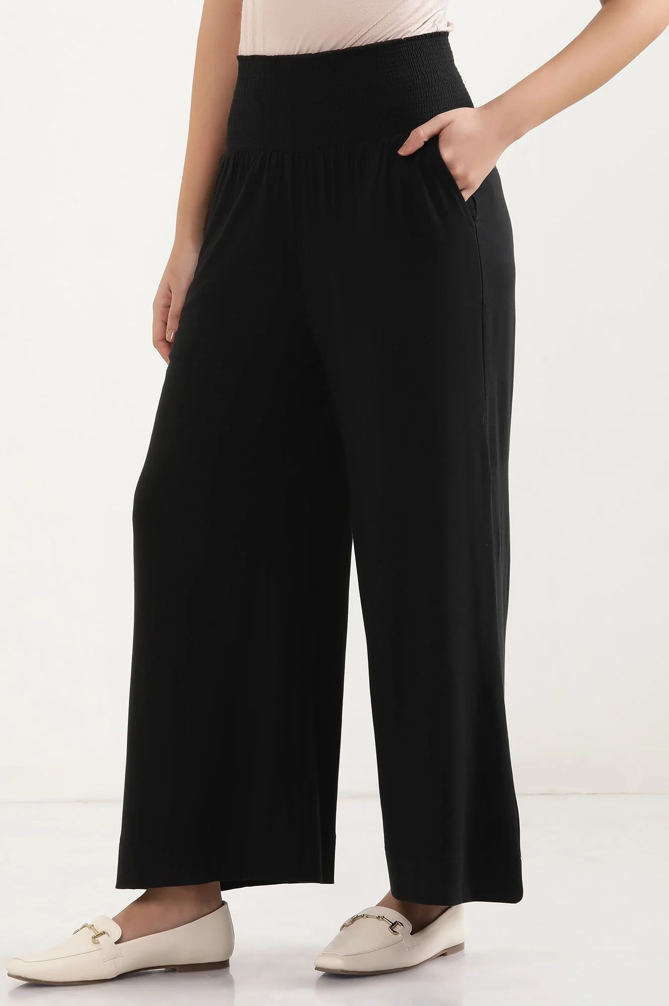 Black Solid Flared Pants With Smocked Waistbelt - Image 3
