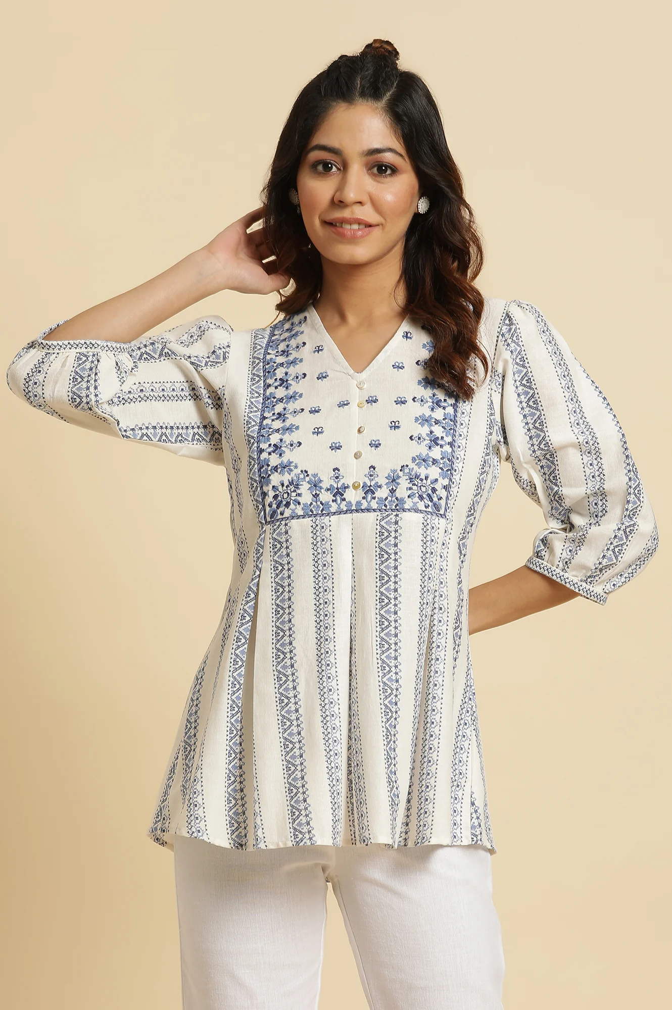 Ecru Peplum Top In Blue Print