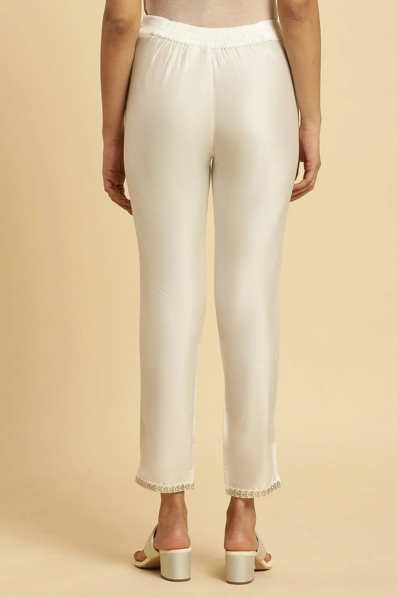 Ecru Slim Pants With Embroidered Hemline - Image 3