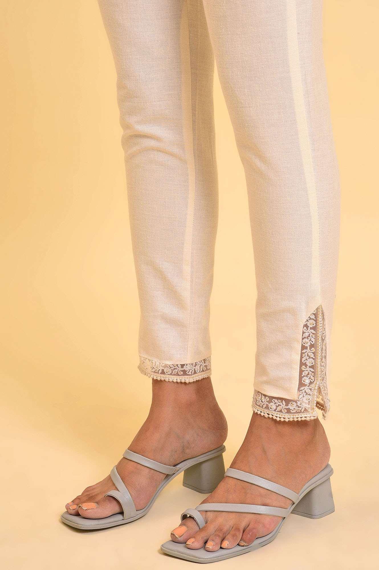 Ecru Solid Slim Pants With Lace On Hem - Image 9