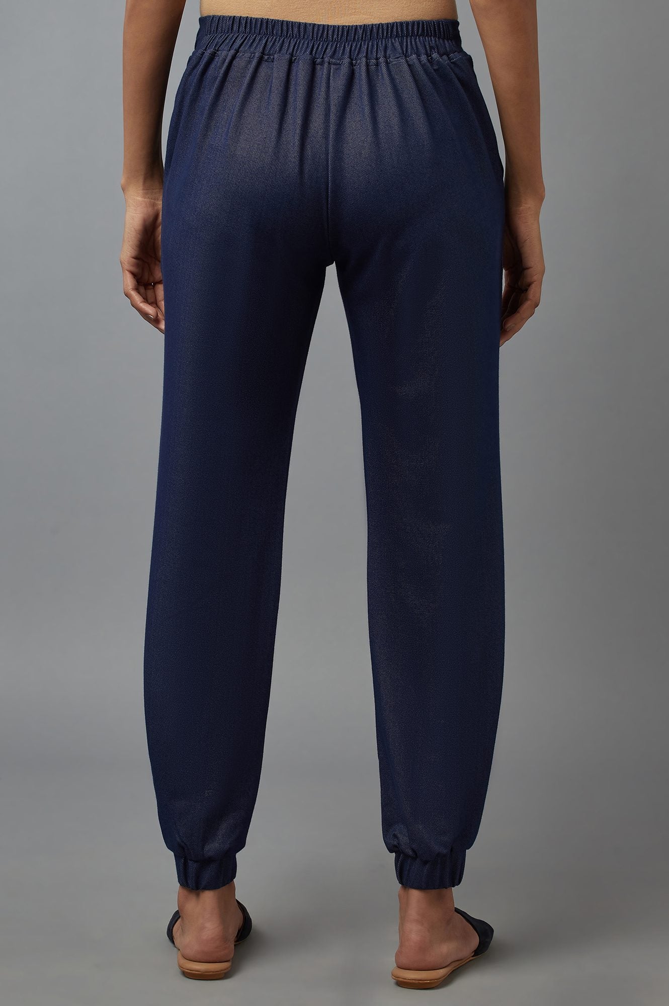 Navy Blue Solid Tapered Cotton Pants With Pleated Detail - Image 2