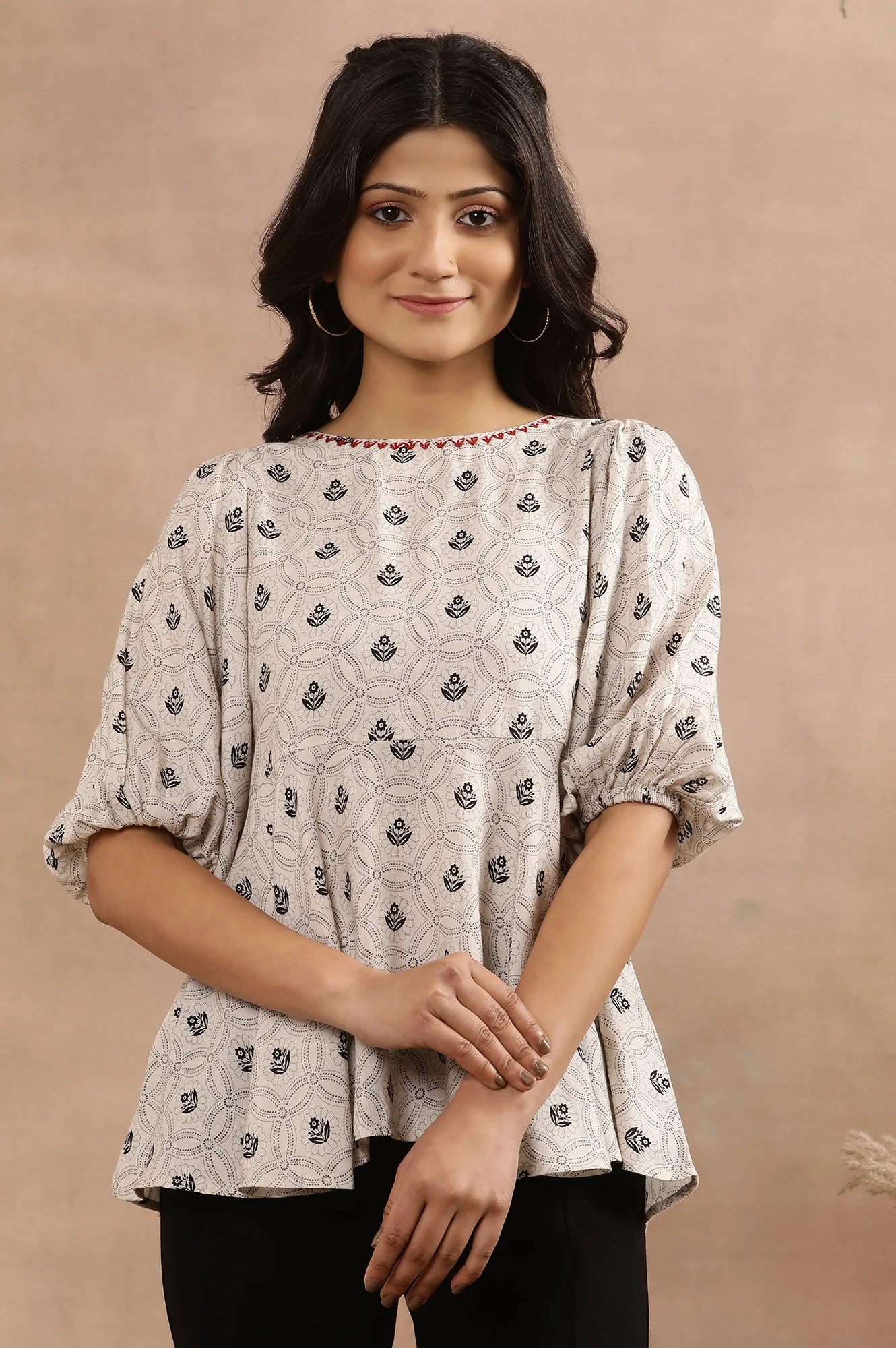 Off-White Printed Peplum Top