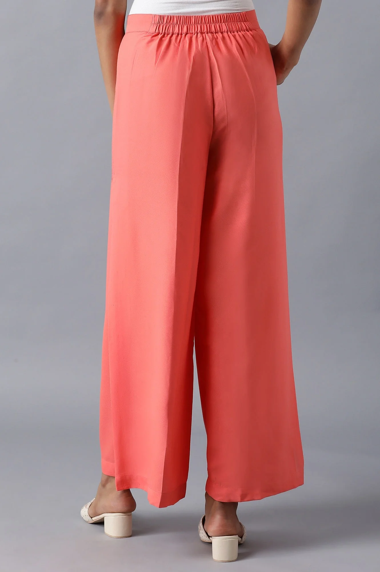 Pink Solid Flared Woven Palazzo With Side Pleats - Image 2