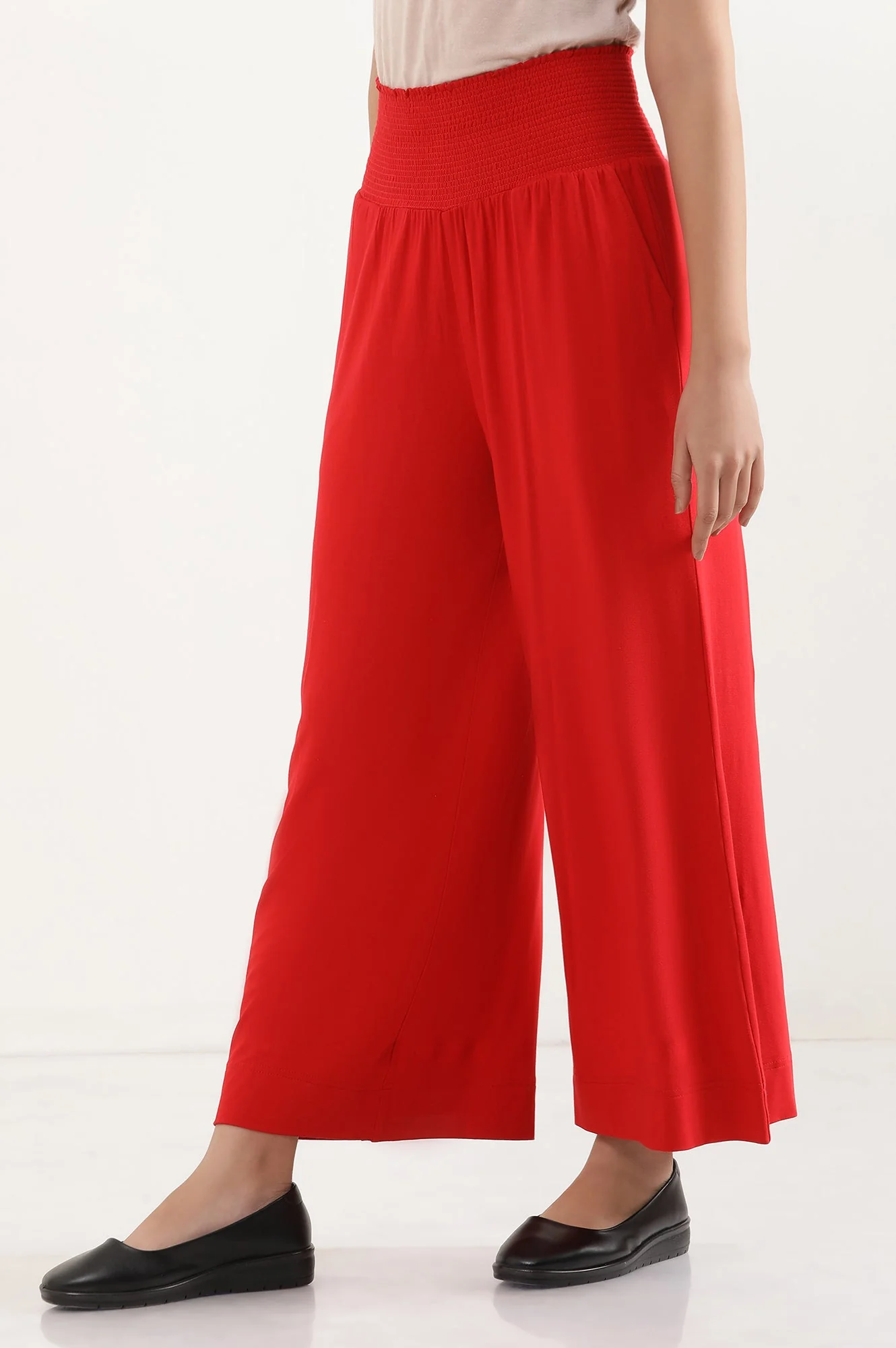 Red Solid Flared Pants With Smocked Waistbelt - Image 3